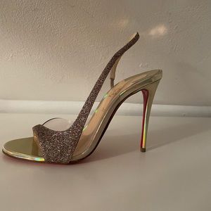 Selling these beautiful CL open toe gold sparkly heels.